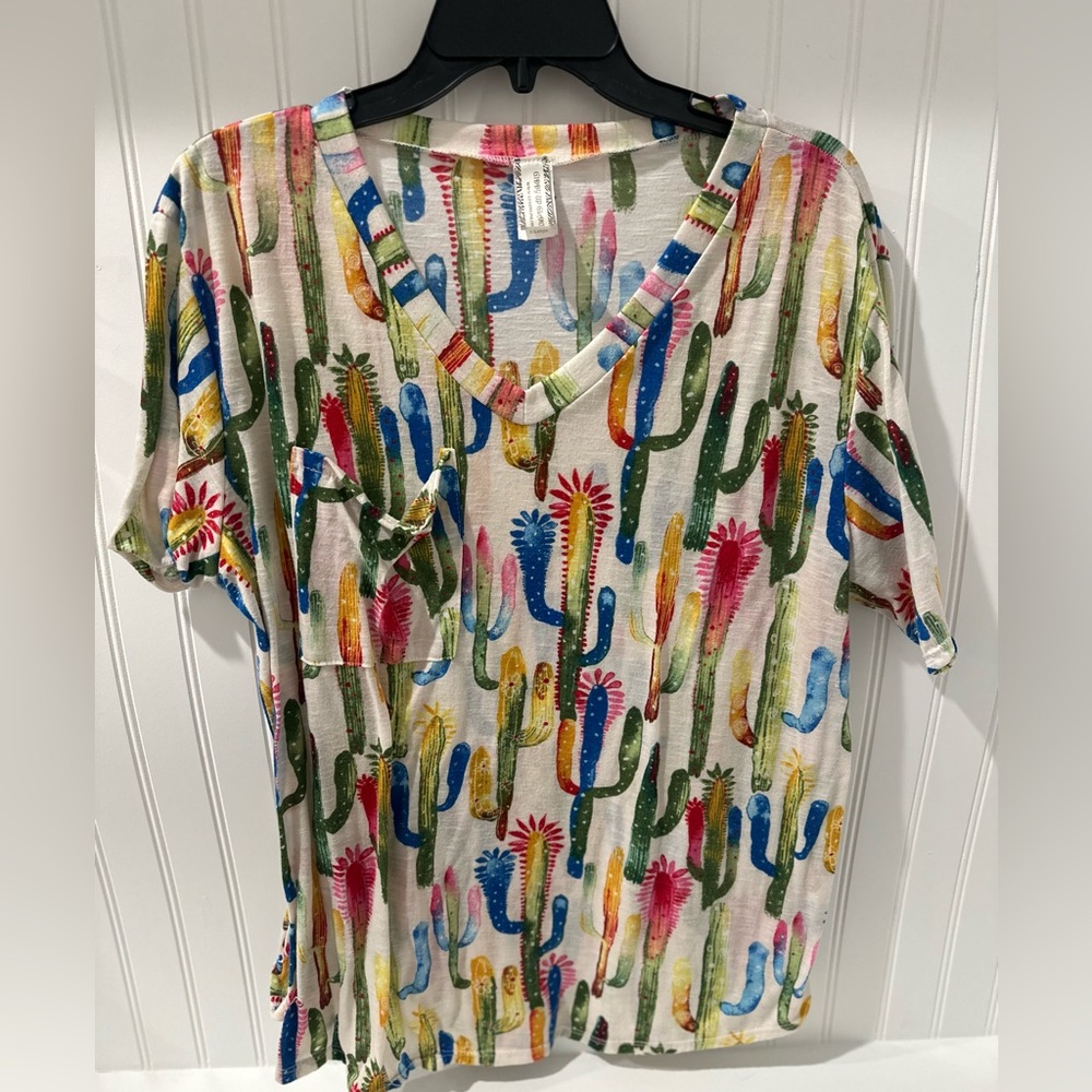 Look sharp in this bold colored pocket tee